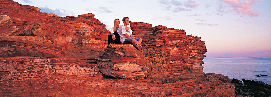 Australia; Western Australia; Broome; Gantheaume Point; Couple on rocky cliff