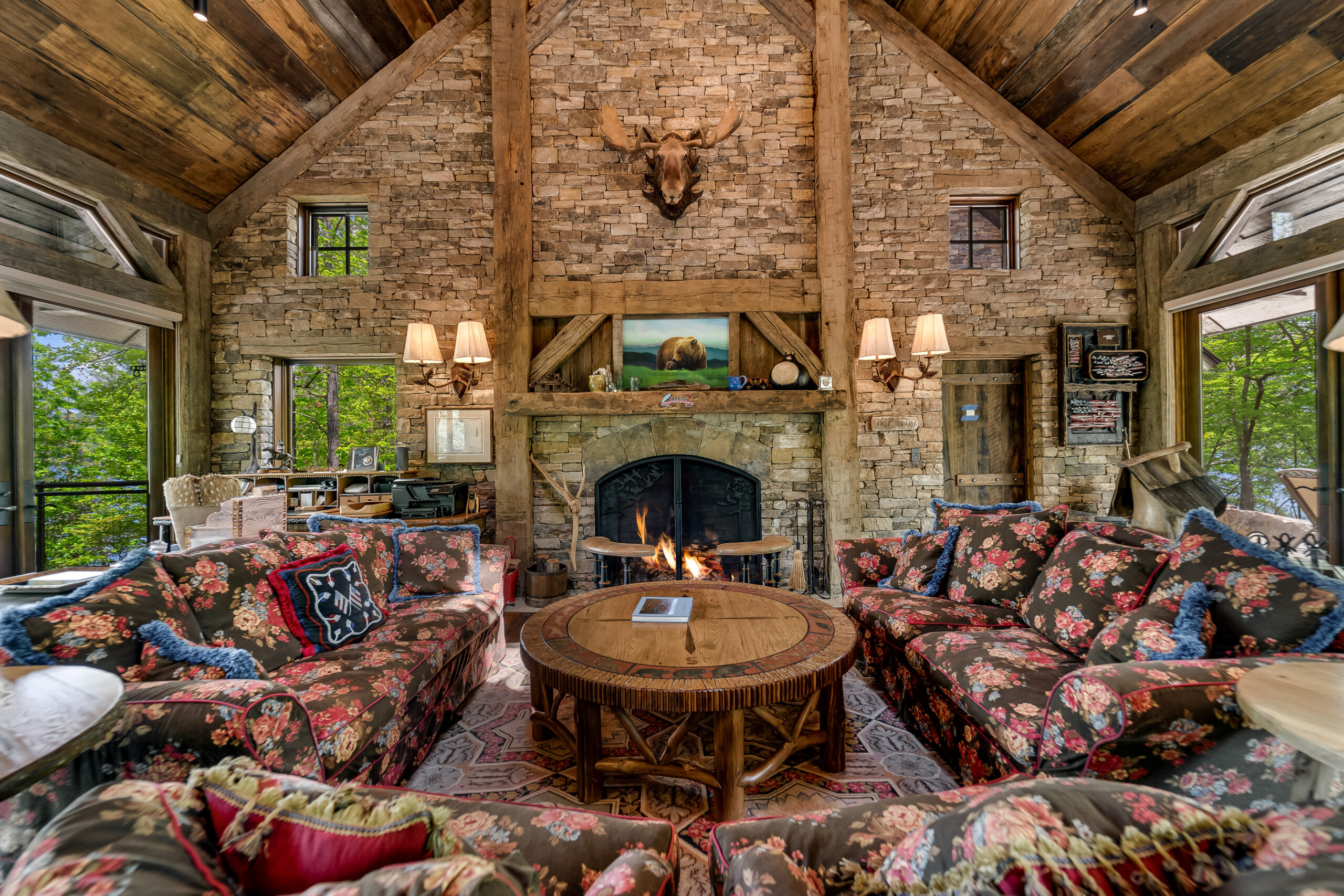 Julie Barnett3 Elegant rustic great room with vaulted ceilings and stone fireplace in Lake Burton estate