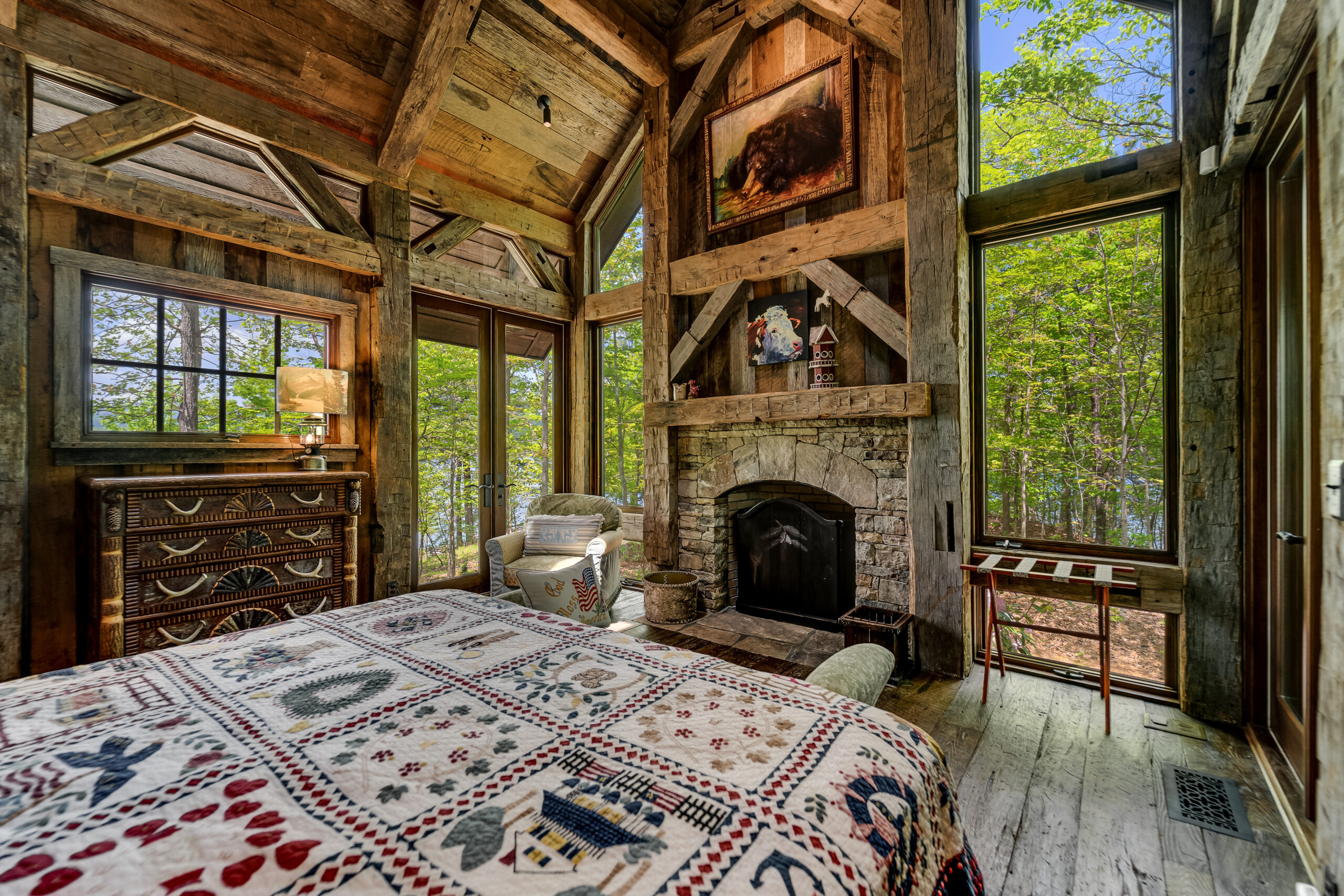 Julie Barnett6 Cozy bedroom with wood beams and lake view in Lake Burton private island home
