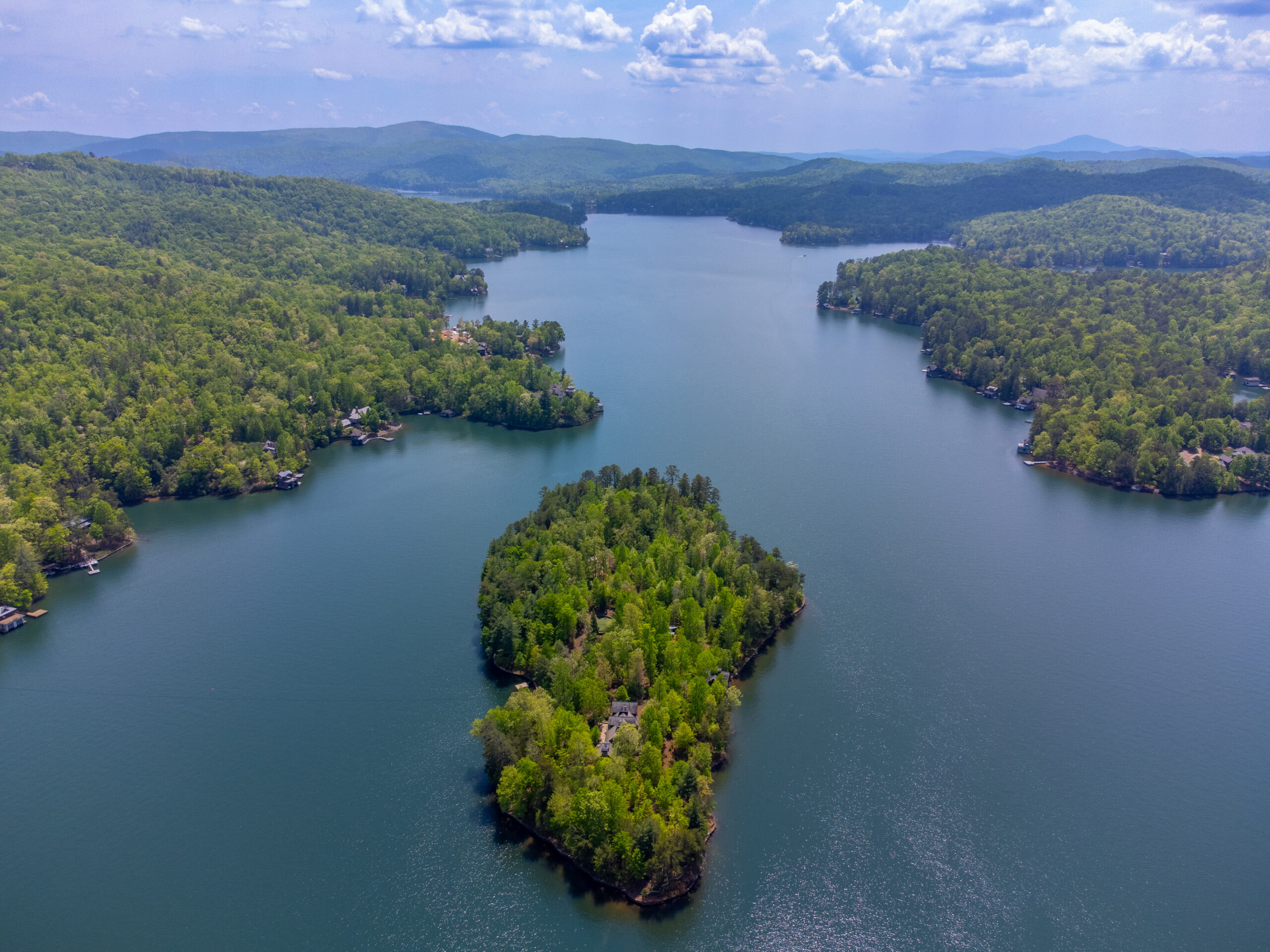 Julie Barnett9 Aerial photo of Lake Burton with private island estate and surrounding mountains