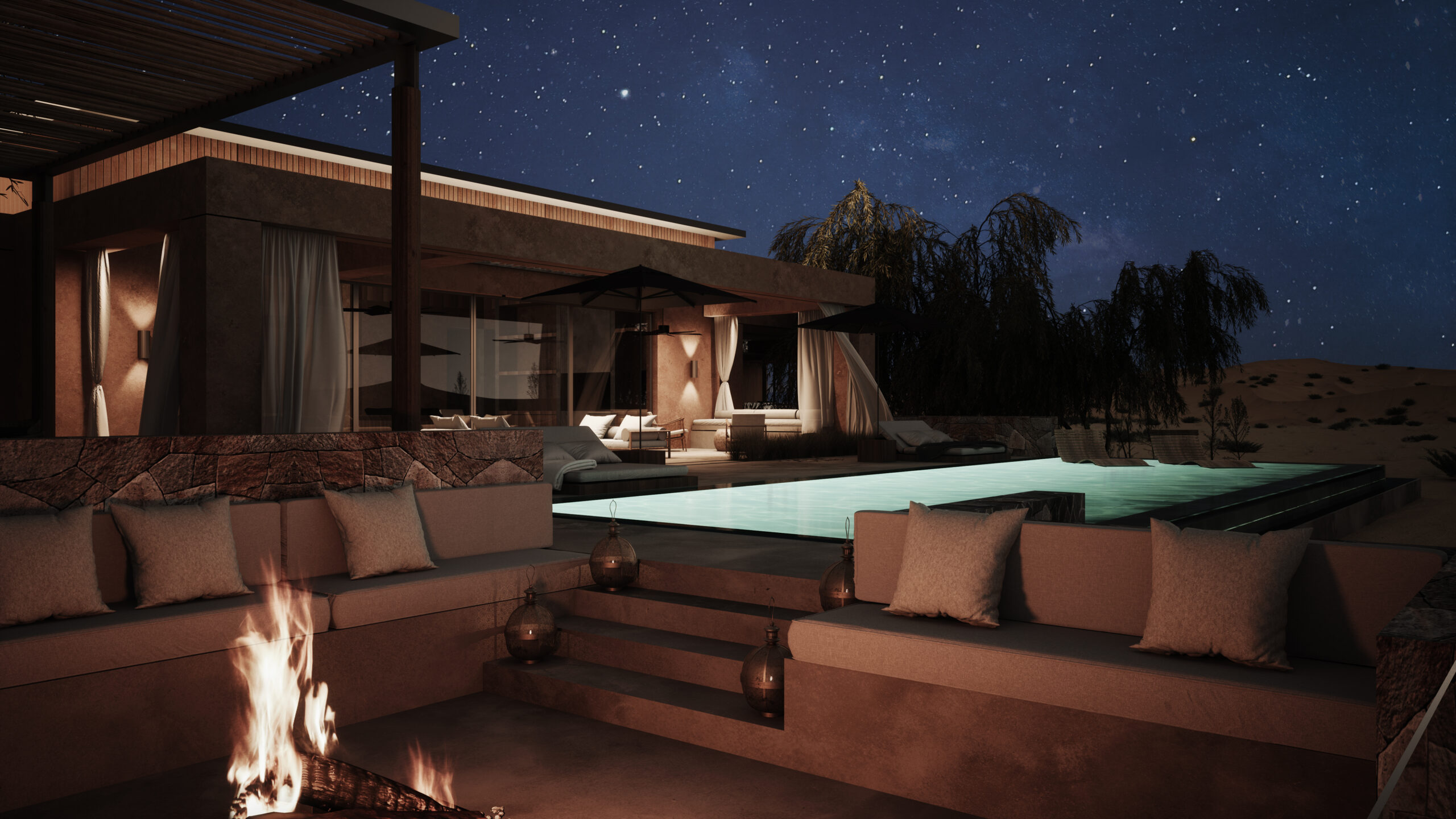 Home at night with pool and fire pit.