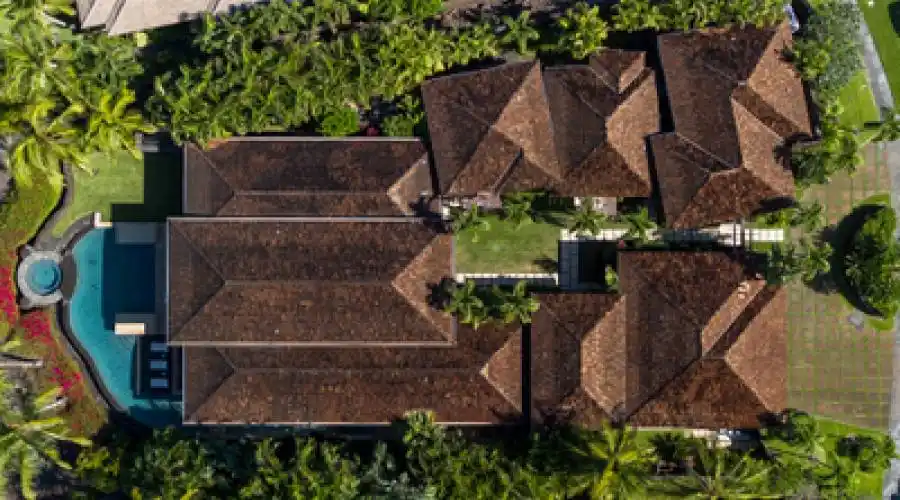 Gated touch pad entry into a private courtyard creates exclusive privacy.