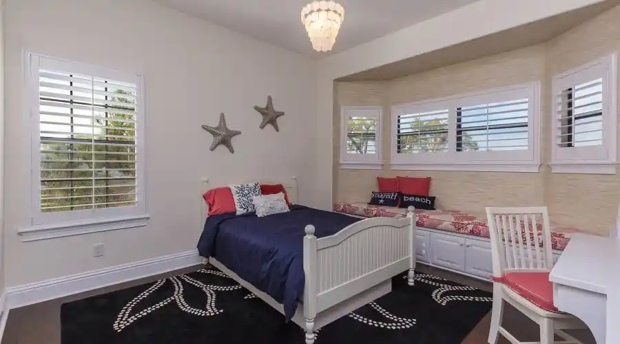 Features a walk in closet and a private bathroom
