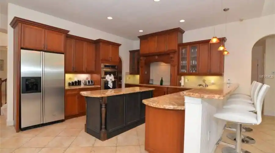 Gourmet Kitchen with Custom Cabinets and Granite
