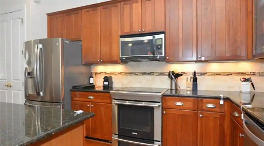 Kitchen with Granite and Stainless Steel Appliances