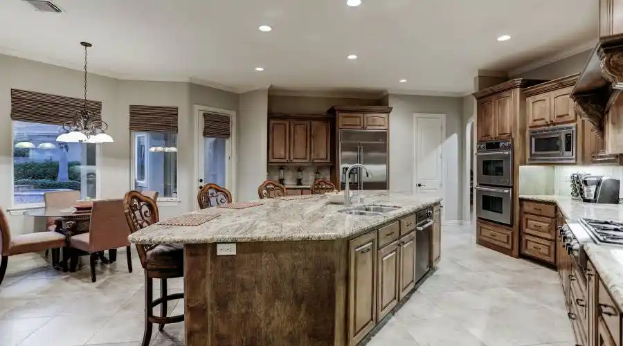 Island spacious enough for family and guest to visit while prepping meals